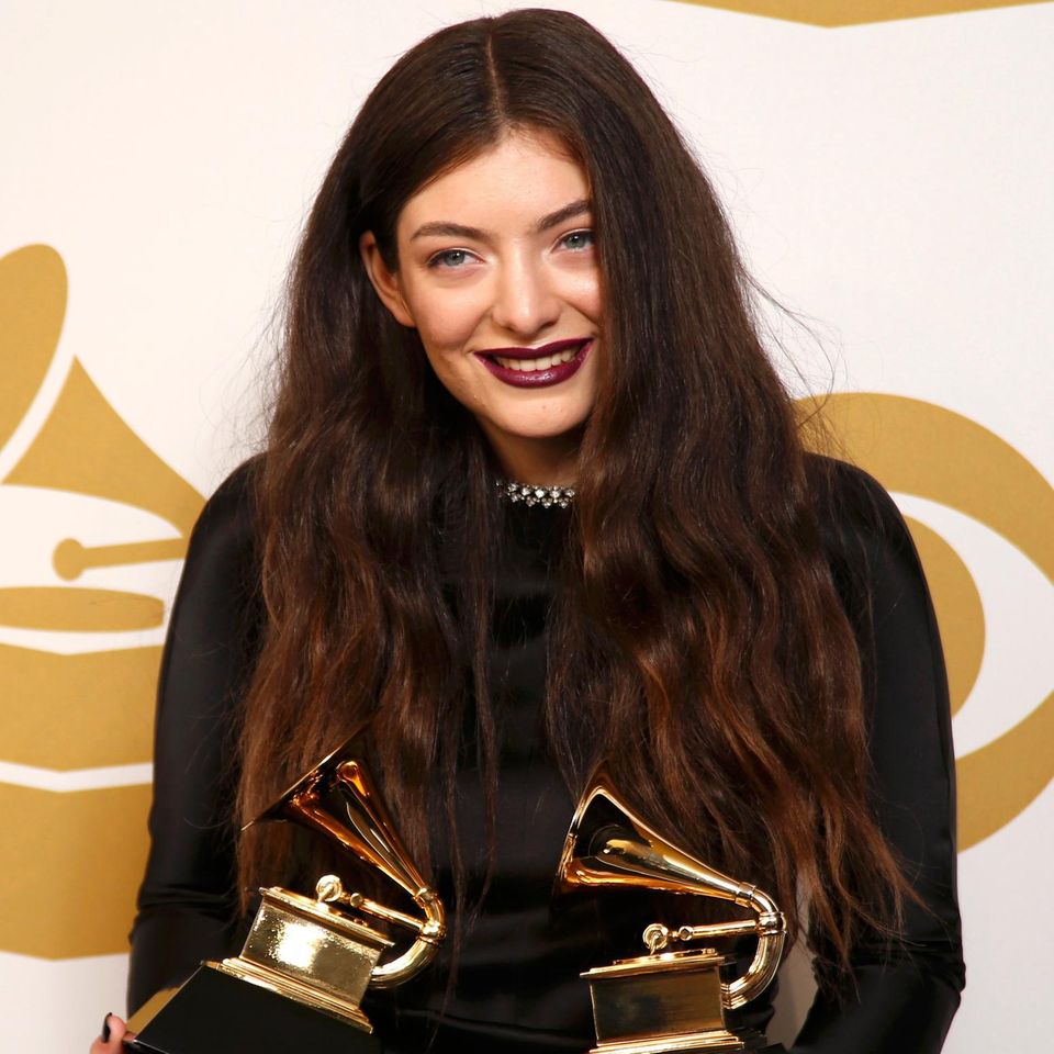 Pop Singer Lorde poses backstage with her awards for Song of the Year for 'Royals' and Best Pop Solo performance also for 'Roya…