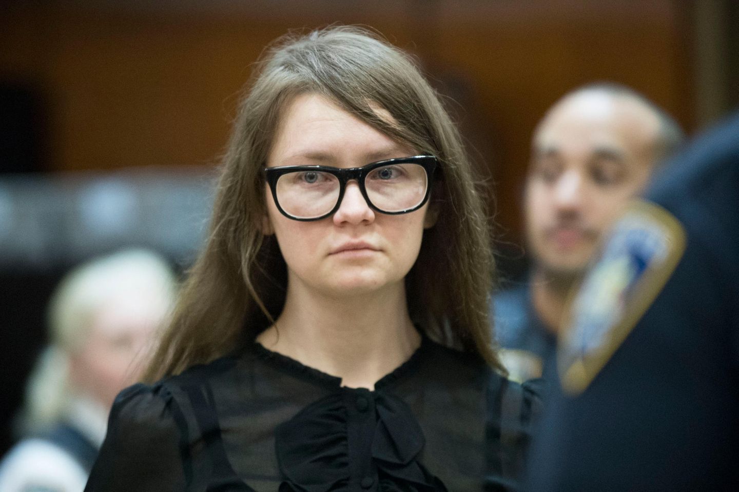 FILE - In this April 25, 2019, file photo, Anna Sorokin, who claimed to be a German heiress, returns to the courtroom during her trial on grand larceny and theft of services charges in New York.    A state website shows that Sorokin was freed into pa