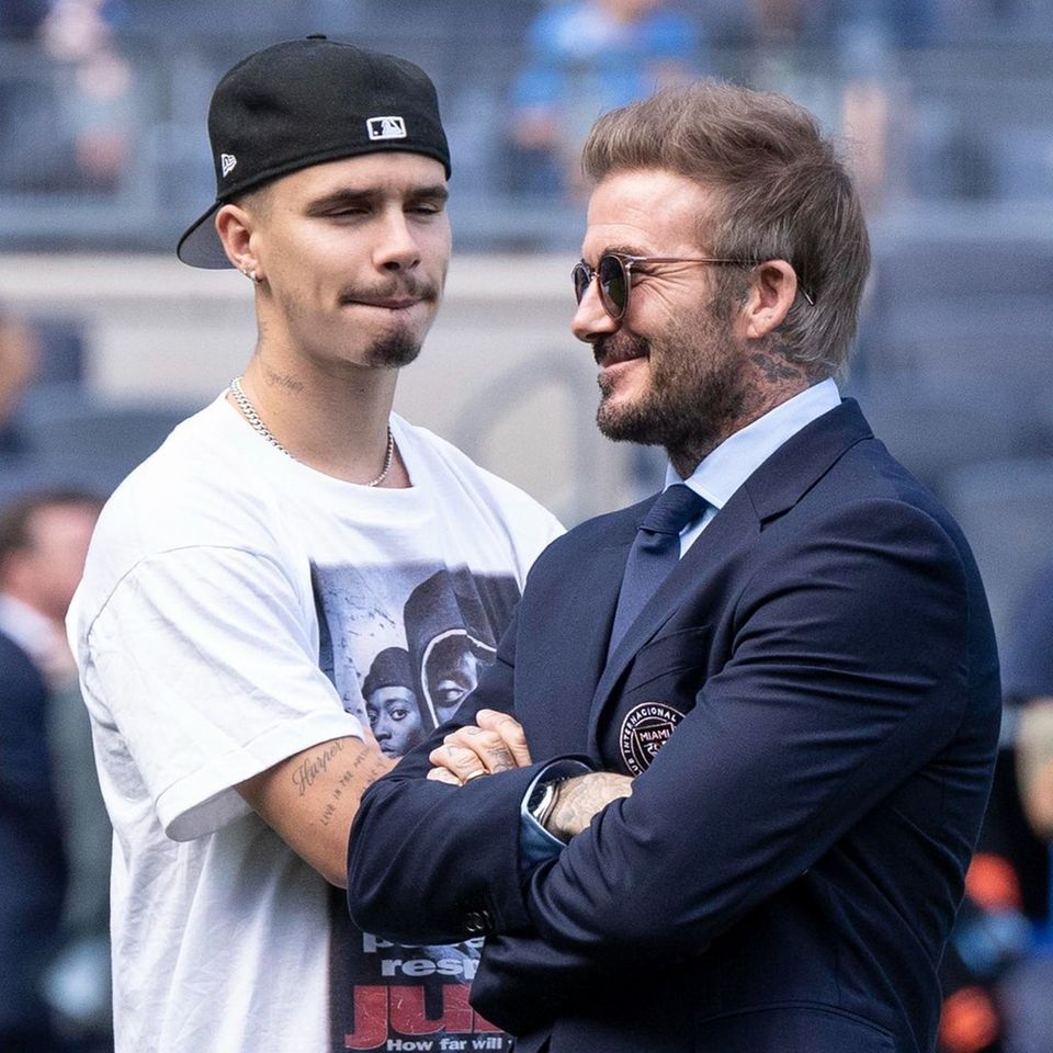 Vater und Sohn: David Beckham und Romeo Beckham.